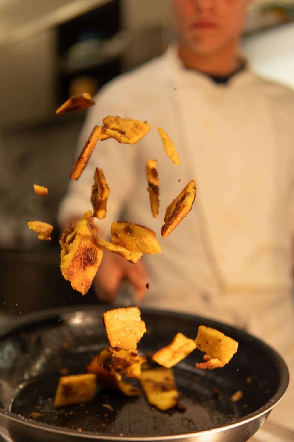 Kaiserschmarrn tossed in the pan in La Raisc’s kitchen. Photograph by Luca Canins.
